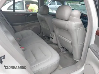 2003 Cadillac DeVille with VIN 1G6KD54Y93U179035, listed as a IAAI auction lot 42114653 with 112,591 mi miles. Bid and sale history available at carsss.com. Image 8.