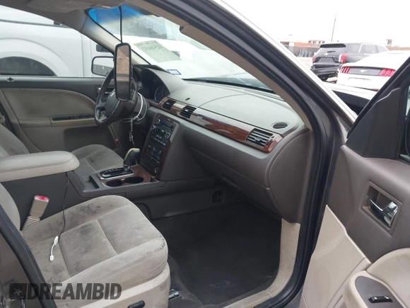 2008 Ford Taurus SEL with VIN 1FAHP24W28G108122, listed as a IAAI auction lot 41546652 with 219,774 mi miles. Bid and sale history available at carsss.com. Image 5.