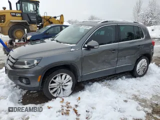 2017 Volkswagen Tiguan with VIN WVGMV7AX3HK020715, listed as a Copart auction lot 82881334 with 195,196 mi miles and Clean title. Bid and sale history available at DreamBid. Image 1.