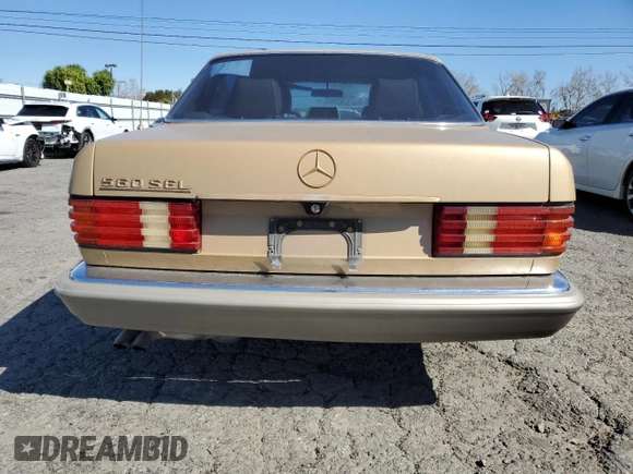 1987 Mercedes-Benz 560 with VIN WDBCA39D1HA280016, listed as a Copart auction lot 46277905 with 151,078 mi miles and Clean Title. Bid and sale history available at DreamBid. Image 6.