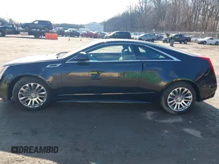 2014 Cadillac CTS Premium with VIN 1G6DH1E32E0177775, listed as a IAAI auction lot 41540366 with 106,398 mi miles and . Bid and sale history available at DreamBid. Image 14.
