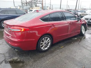 2019 Ford Fusion SE with VIN 3FA6P0HD0KR104302, listed as a IAAI auction lot 41550333 with 73,894 mi miles. Bid and sale history available at carsss.com. Image 4.