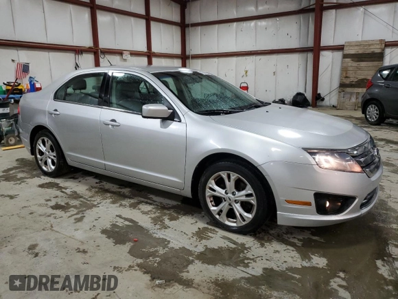 2012 Ford Fusion SE z VIN 3FAHP0HA5CR371175, wystawiony jako Copart lot #52073675 z przebiegiem 135 813 mil mil oraz Czysty tytuł • Clean title. Historia ofert i sprzedaży dostępna na DreamBid. Obrazek 4.