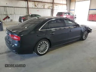 2016 Audi A8 Sport z VIN WAU43AFD1GN011589, wystawiony jako Copart lot #86614934 z przebiegiem 96 137 mil mil oraz Szkoda całkowita • Salvage title. Historia ofert i sprzedaży dostępna na DreamBid. Obrazek 3.