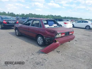 1991 Toyota Camry DLX z VIN 4T1SV21E0MU347371, wystawiony jako IAAI lot #42048695 z przebiegiem 209 451 mil mil oraz . Historia ofert i sprzedaży dostępna na DreamBid. Obrazek 3.