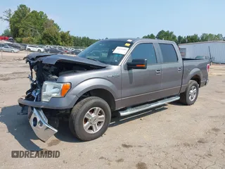 2014 Ford F-150 XL with VIN 1FTFW1CF2EKF75517, listed as a IAAI auction lot 40534480 with 121,035 mi miles. Bid and sale history available at carsss.com. Image 2.