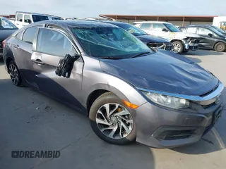 2017 Honda Civic EX z VIN 19XFC2F7XHE056273, wystawiony jako IAAI lot #42087934 z przebiegiem 95 871 mil mil oraz . Historia ofert i sprzedaży dostępna na DreamBid. Obrazek 1.