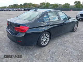 2018 BMW 3 Series 320i with VIN WBA8E1G57JNU88781, listed as a IAAI auction lot 42019246 with 56,820 mi miles. Bid and sale history available at carsss.com. Image 4.