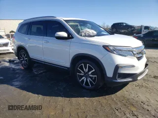 2021 Honda Pilot Touring 8-Passenger with VIN 5FNYF5H94MB001855, listed as a Copart auction lot 87891185 with 55,097 mi miles and Salvage Title. Bid and sale history available at DreamBid. Image 4.