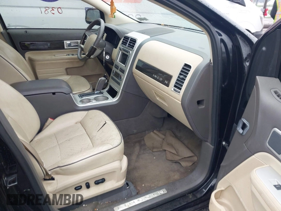 2008 Lincoln MKX with VIN 2LMDU68C68BJ27207, listed as a IAAI auction lot 41980381 with 143,819 mi miles. Bid and sale history available at carsss.com. Image 5.