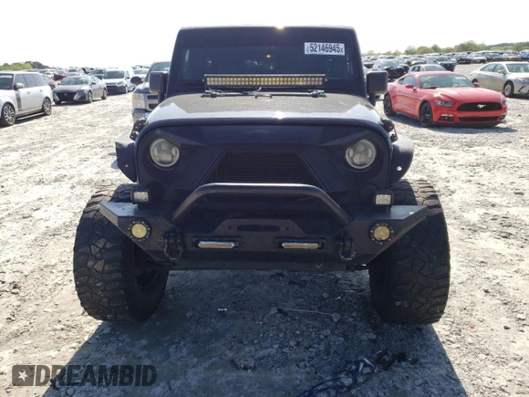2013 Jeep Wrangler Unlimited Moab with VIN 1C4HJWEG7DL600043, listed as a Copart auction lot 52146945 with 118,882 mi miles and Salvage title. Bid and sale history available at DreamBid. Image 5.