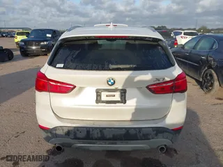 2016 BMW X1 xDrive28i with VIN WBXHT3C3XGP889461, listed as a IAAI auction lot 41757627 with 105,681 mi miles. Bid and sale history available at carsss.com. Image 16.