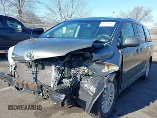 2011 Toyota Sienna XLE AAS with VIN 5TDYK3DC4BS072693, listed as a IAAI auction lot 41579262 with 146,201 mi miles. Bid and sale history available at carsss.com. Image 2.