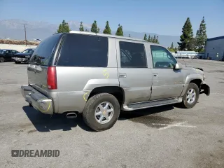 2000 Cadillac Escalade z VIN 1GYEK63R8YR228214, wystawiony jako Copart lot #73567434 z przebiegiem 235 399 mil mil oraz Szkody całkowita. Historia ofert i sprzedaży dostępna na DreamBid. Obrazek 3.
