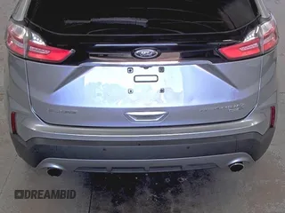 2020 Ford Edge Titanium z VIN 2FMPK4K91LBA91290, wystawiony jako IAAI lot #42494043 z przebiegiem 71 254 mil mil oraz . Historia ofert i sprzedaży dostępna na DreamBid. Obrazek 27.