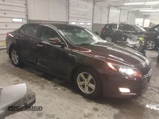 2015 Kia Optima LX with VIN 5XXGM4A77FG454789, listed as a IAAI auction lot 41448143 with 84,944 mi miles and . Bid and sale history available at DreamBid. Image 1.