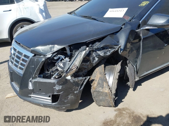 2013 Cadillac XTS Luxury z VIN 2G61R5S33D9184878, wystawiony jako IAAI lot #41644213 z przebiegiem 113 293 mil mil oraz . Historia ofert i sprzedaży dostępna na DreamBid. Obrazek 6.