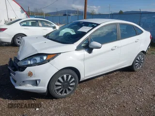 2018 Ford Fiesta S z VIN 3FADP4AJ2JM136775, wystawiony jako IAAI lot #42136725 z przebiegiem 47 072 mil mil oraz . Historia ofert i sprzedaży dostępna na DreamBid. Obrazek 2.