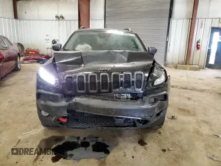 2018 Jeep Cherokee Trailhawk Leather Plus with VIN 1C4PJMBX4JD558201, listed as a Copart auction lot 53462775 with 94,604 mi miles and Salvage title. Bid and sale history available at DreamBid. Image 5.
