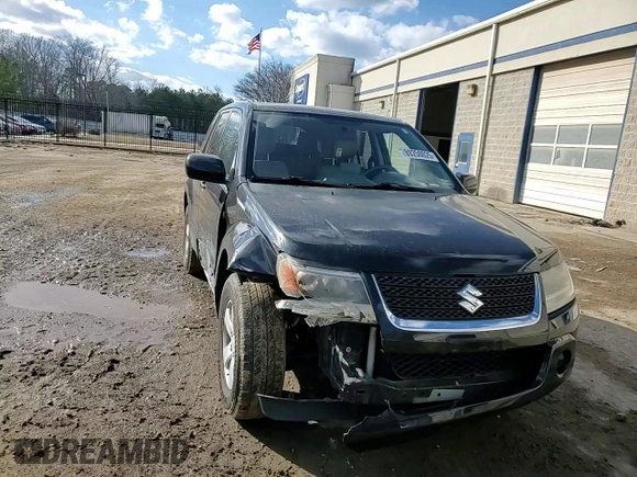 2012 Suzuki Grand Vitara Premium z VIN JS3TD0D66C4100814, wystawiony jako Copart lot #89250025 z przebiegiem 102 381 mil mil oraz Szkody całkowita. Historia ofert i sprzedaży dostępna na DreamBid. Obrazek 12.