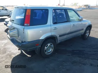 1999 Honda CR-V EX with VIN JHLRD1861XC007657, listed as a IAAI auction lot 42004759 with 180,078 mi miles. Bid and sale history available at carsss.com. Image 4.