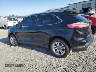 2019 Ford Edge SEL z VIN 2FMPK4J91KBC60322, wystawiony jako Copart lot #53502375 z przebiegiem 103 430 mil mil oraz Szkoda całkowita • Salvage title. Historia ofert i sprzedaży dostępna na DreamBid. Obrazek 2.