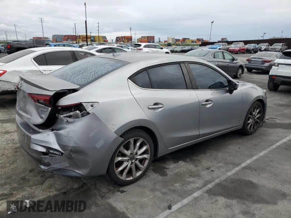 2014 Mazda 3 S Touring with VIN JM1BM1V31E1107453, listed as a Copart auction lot 48769215 with 145,346 mi miles and Salvage Title. Bid and sale history available at DreamBid. Image 3.