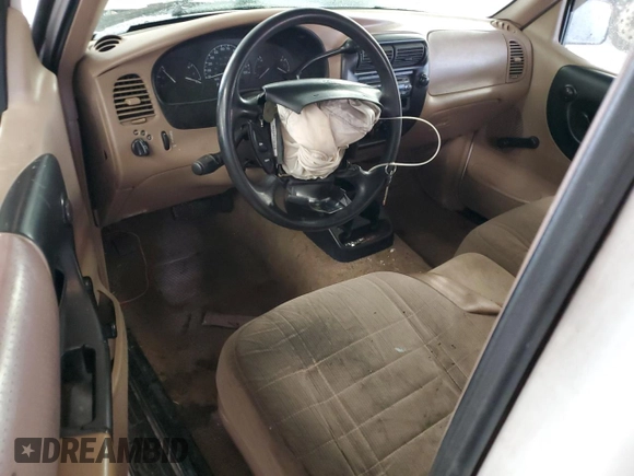 1997 Ford Ranger XLT with VIN 1FTCR14X0VPA56261, listed as a Copart auction lot 45174315 with 213,718 mi miles and Salvage Title. Bid and sale history available at DreamBid. Image 8.