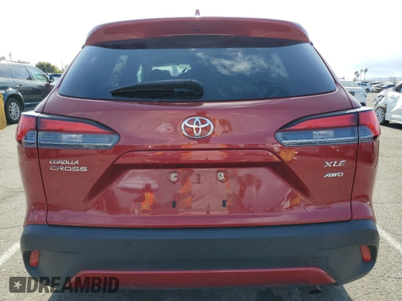 2023 Toyota Corolla Cross XLE with VIN 7MUDAABG5PV054275, listed as a Copart auction lot 54573835 with 42,003 mi miles and Salvage title. Bid and sale history available at DreamBid. Image 6.