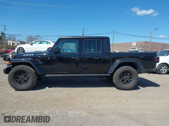 2022 Jeep Gladiator Texas Trail with VIN 1C6HJTAG2NL120506, listed as a IAAI auction lot 42048215 with 65,048 mi miles. Bid and sale history available at carsss.com. Image 13.