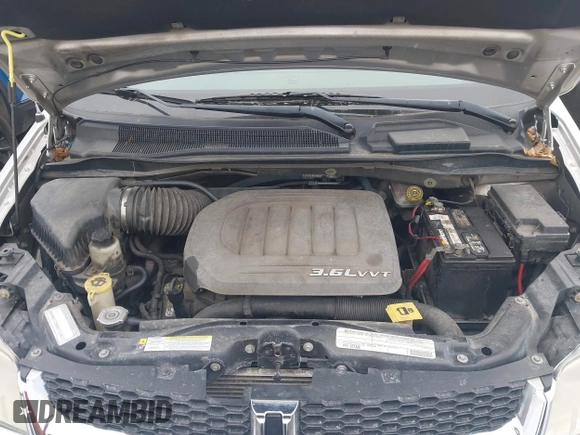 2011 Dodge Grand Caravan Crew with VIN 2D4RN5DGXBR678747, listed as a IAAI auction lot 41899883 with 196,100 mi miles and . Bid and sale history available at DreamBid. Image 10.