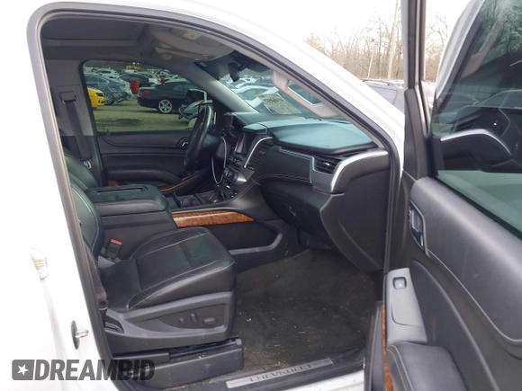 2015 Chevrolet Tahoe LTZ z VIN 1GNSKCKC5FR177134, wystawiony jako IAAI lot #41460583 z przebiegiem 202 924 mil mil oraz . Historia ofert i sprzedaży dostępna na DreamBid. Obrazek 5.