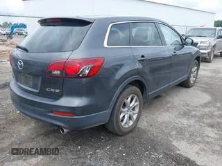 2014 Mazda CX-9 Touring z VIN JM3TB2CAXE0445450, wystawiony jako IAAI lot #42477260 z przebiegiem 139 583 mil mil oraz . Historia ofert i sprzedaży dostępna na DreamBid. Obrazek 4.