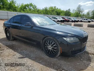 2013 BMW 7 Series 750i with VIN WBAYA8C5XDC996785, listed as a Copart auction lot 54854165 with 134,472 mi miles and Clean Title. Bid and sale history available at carsss.com. Image 4.
