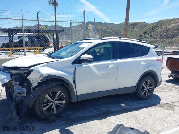 2016 Toyota RAV4 XLE with VIN JTMWFREV5GJ098870, listed as a IAAI auction lot 41878605 with 109,996 mi miles. Bid and sale history available at carsss.com. Image 14.
