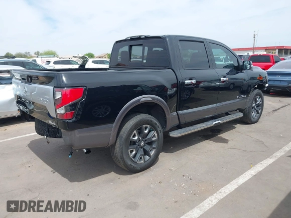 2021 Nissan Titan Pro-4X with VIN 1N6AA1ED8MN529124, listed as a IAAI auction lot 42212989 with 63,652 mi miles and . Bid and sale history available at DreamBid. Image 4.