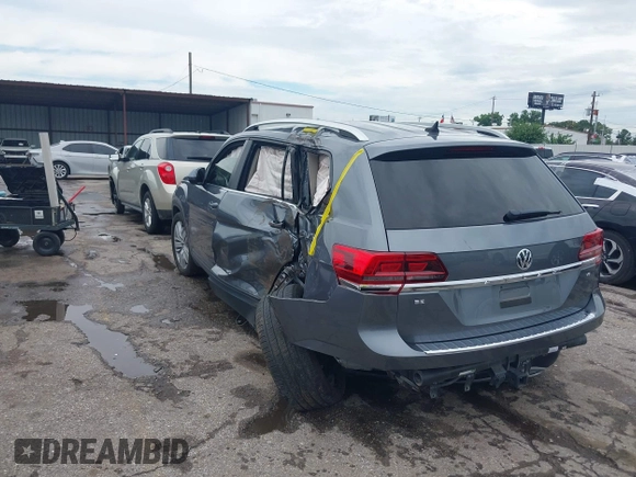 2019 Volkswagen Atlas SE with VIN 1V2WR2CA5KC514748, listed as a IAAI auction lot 42367164 with 57,827 mi miles and . Bid and sale history available at DreamBid. Image 3.
