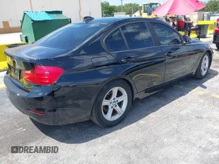 2014 BMW 3 Series 320i with VIN WBA3B1C55EK135357, listed as a IAAI auction lot 42158550 with 148,911 mi miles. Bid and sale history available at carsss.com. Image 4.