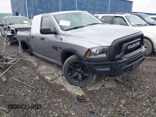 2021 Ram 1500 Classic Warlock with VIN 1C6RR7GT2MS595912, listed as a IAAI auction lot 41733123 with 33,156 mi miles. Bid and sale history available at carsss.com. Image 1.