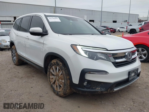 2020 Honda Pilot EX-L with VIN 5FNYF5H55LB029238, listed as a IAAI auction lot 41330490 with 116,787 mi miles. Bid and sale history available at carsss.com. Image 1.