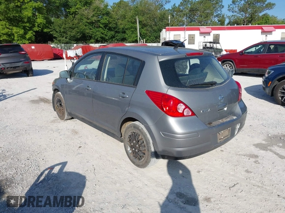 2012 Nissan Versa S with VIN 3N1BC1CP8CK242212, listed as a IAAI auction lot 42027327 with 117,118 mi miles. Bid and sale history available at carsss.com. Image 3.