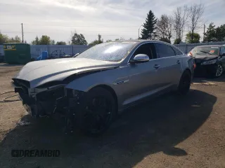 2011 Jaguar XJ with VIN SAJXA2GE5BMV13122, listed as a Copart auction lot 73113044 with 164,196 mi miles and Salvage Title. Bid and sale history available at DreamBid. Image 1.