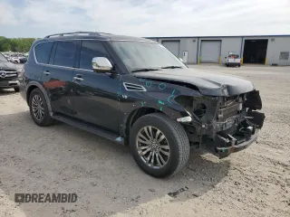 2018 Nissan Armada Platinum z VIN JN8AY2NF5J9332894, wystawiony jako Copart lot #52749905 z przebiegiem 128 352 mil mil oraz Szkody całkowita. Historia ofert i sprzedaży dostępna na DreamBid. Obrazek 4.