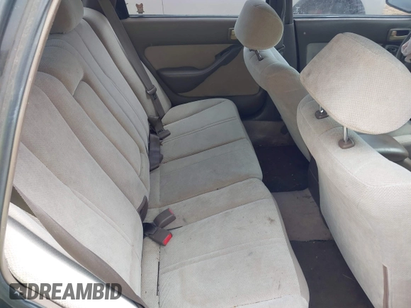 1996 Toyota Camry LE z VIN 4T1EF12K9TU117514, wystawiony jako IAAI lot #42241880 z przebiegiem 192 764 mil mil oraz . Historia ofert i sprzedaży dostępna na DreamBid. Obrazek 8.