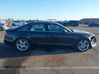 2014 Audi A6 Premium Plus with VIN WAUGFAFC7EN014764, listed as a IAAI auction lot 42261384 with 117,285 mi miles and . Bid and sale history available at DreamBid. Image 13.