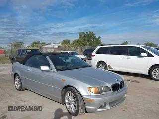 2004 BMW 3 Series 330Ci with VIN WBABW534X4PL45274, listed as a IAAI auction lot 41437124 with 124,001 mi miles. Bid and sale history available at carsss.com. Image 5.