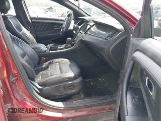 2014 Ford Taurus SEL z VIN 1FAHP2E82EG157445, wystawiony jako IAAI lot #42133676 z przebiegiem 174 616 mil mil oraz . Historia ofert i sprzedaży dostępna na DreamBid. Obrazek 5.