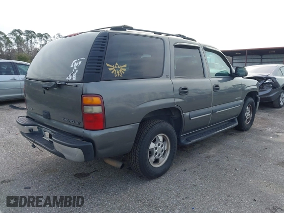 2002 Chevrolet Tahoe LS with VIN 1GNEC13VX2R156255, listed as a IAAI auction lot 41376768 with 246,305 mi miles. Bid and sale history available at carsss.com. Image 4.