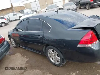 2014 Chevrolet Impala LT with VIN 2G1WB5E35E1123415, listed as a IAAI auction lot 41101111 with 129,870 mi miles and . Bid and sale history available at DreamBid. Image 14.