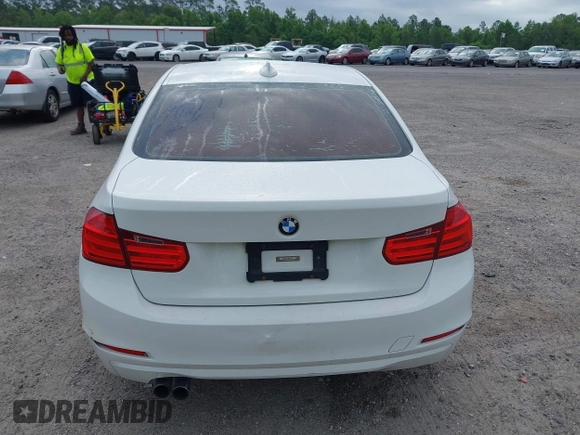 2015 BMW 3 Series 328i with VIN WBA3A5C50FF608327, listed as a IAAI auction lot 42136156 with 213,945 mi miles. Bid and sale history available at carsss.com. Image 16.
